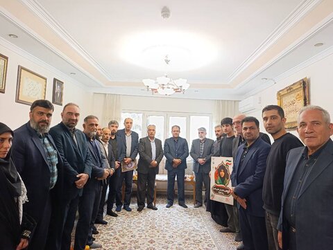 تجلیل هیات پزشکی ورزشی استان تهران خانواده دو شهیدکاراته کار جنگ رمضان