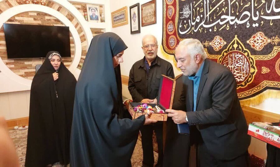 تکریم خانواده ورزشکار شهید جنگ رمضان محمد ملایی در خراسان جنوبی