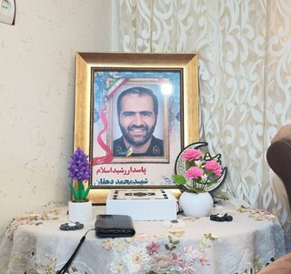 تجلیل رئیس فدراسیون پزشکی ورزشی از خانواده دو شهید والامقام